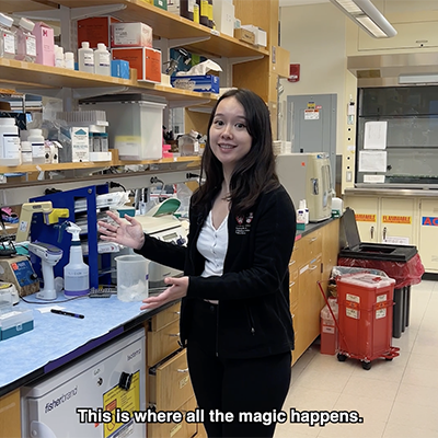 Jessica Chen standing in front of a lab bench